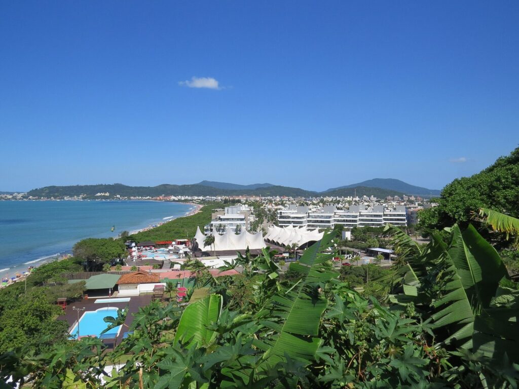Panorama of Jurerê Internacional beach and the low-rise neighbourhood behind it