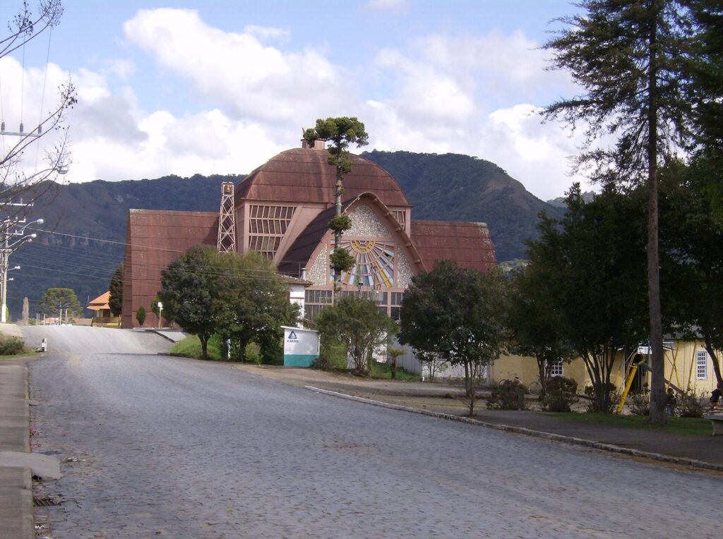 The brick parish church of Nossa Senhora Mãe dos Homens at the end of a street in Urubici